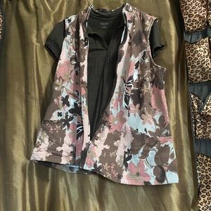 Brown top with shades of pink mauve and brown vest